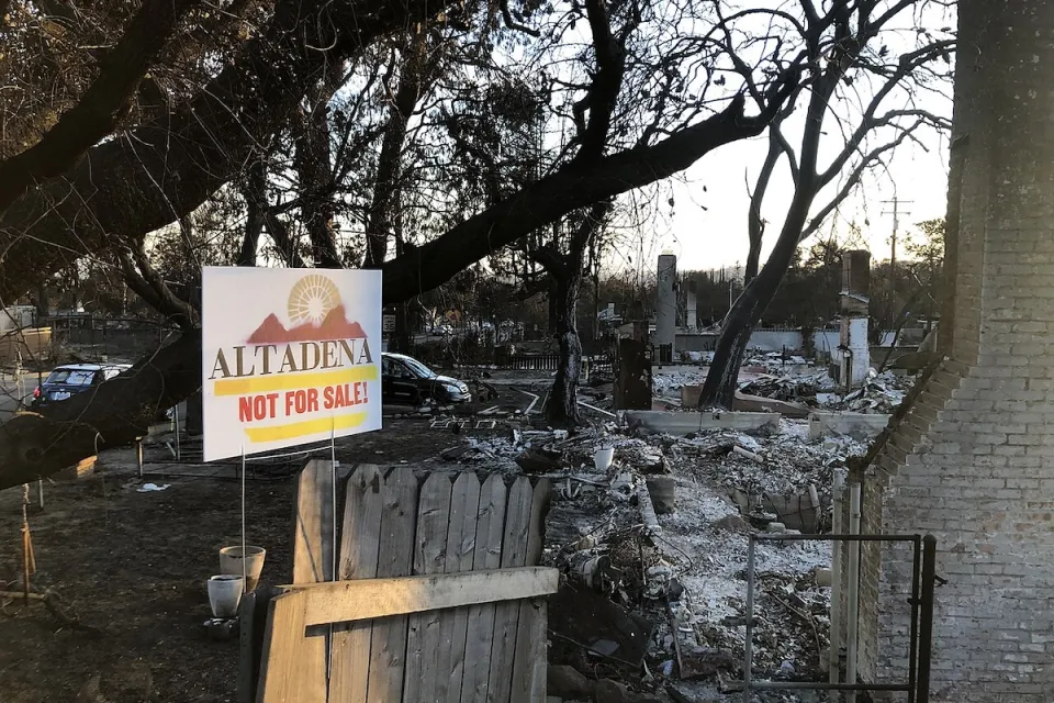 "Altadena - Not For Sale" yard sign in front of burned down house after Eaton Fire in Altadena, California in January 2025.